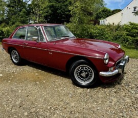 Red classic car workshop example